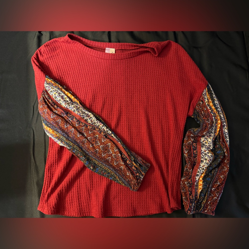 Elegant Red Long Sleeve Top with Patterned Sleeves